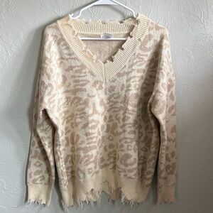 Main Strip Distressed Leopard Jacquard V-Neck Sweater in Cream and Tan